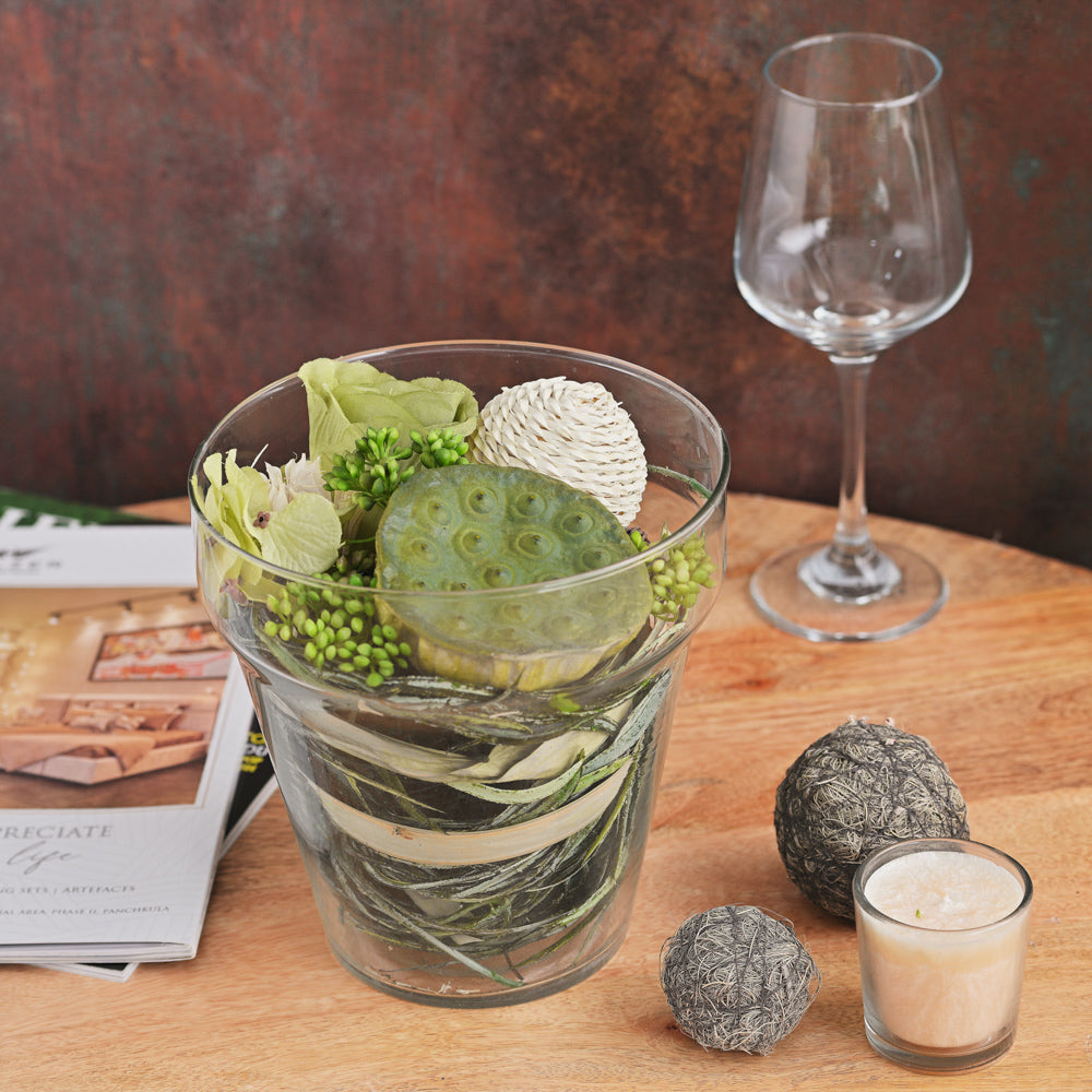 Artificial Green Floral Arrangement in a Glass Vas