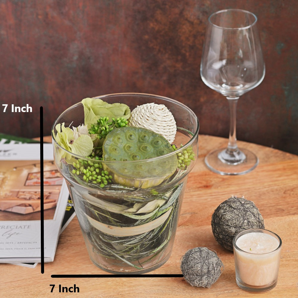 Artificial Green Floral Arrangement in a Glass Vas