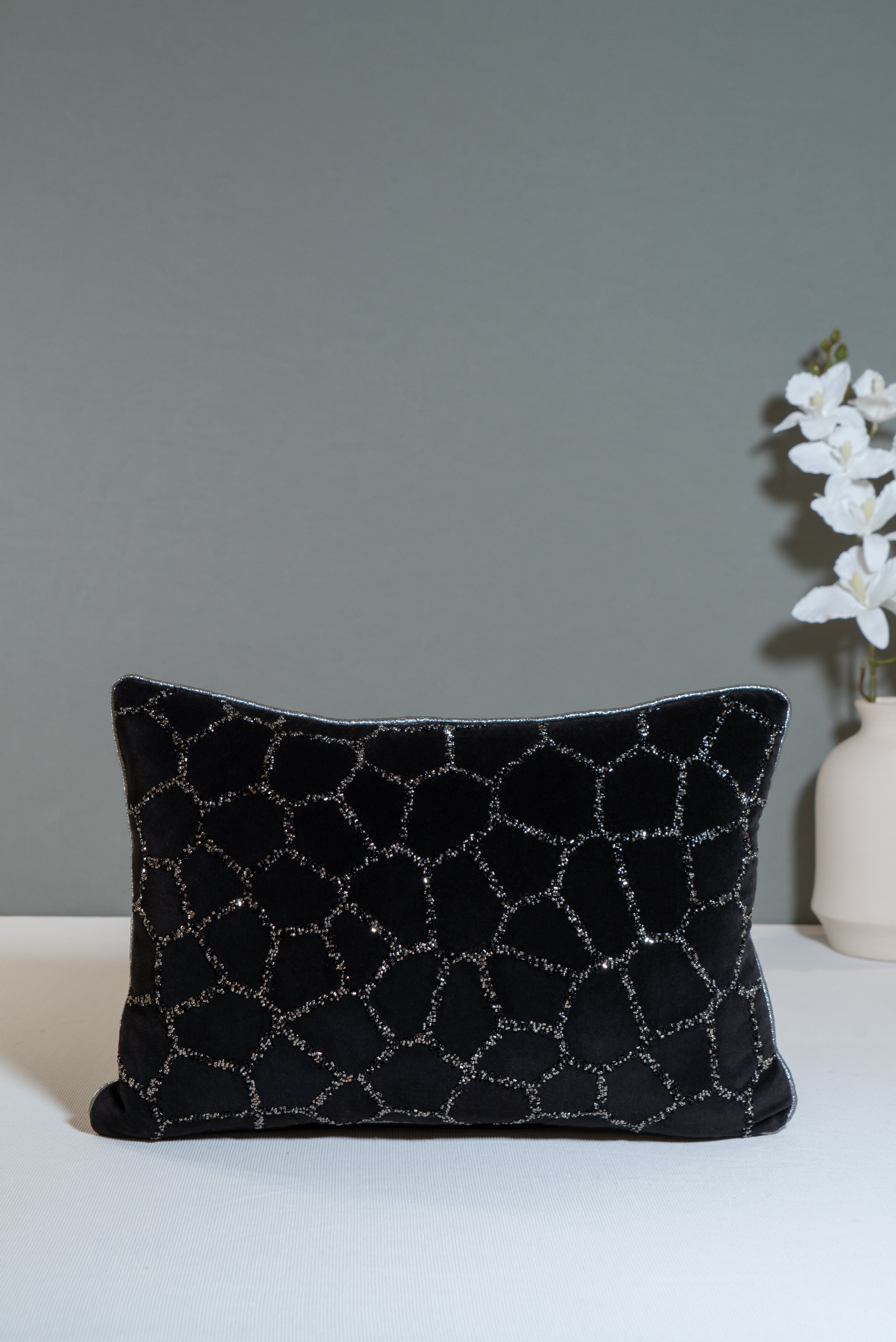 Luxury velvet cushion with a geometric or cracked pattern