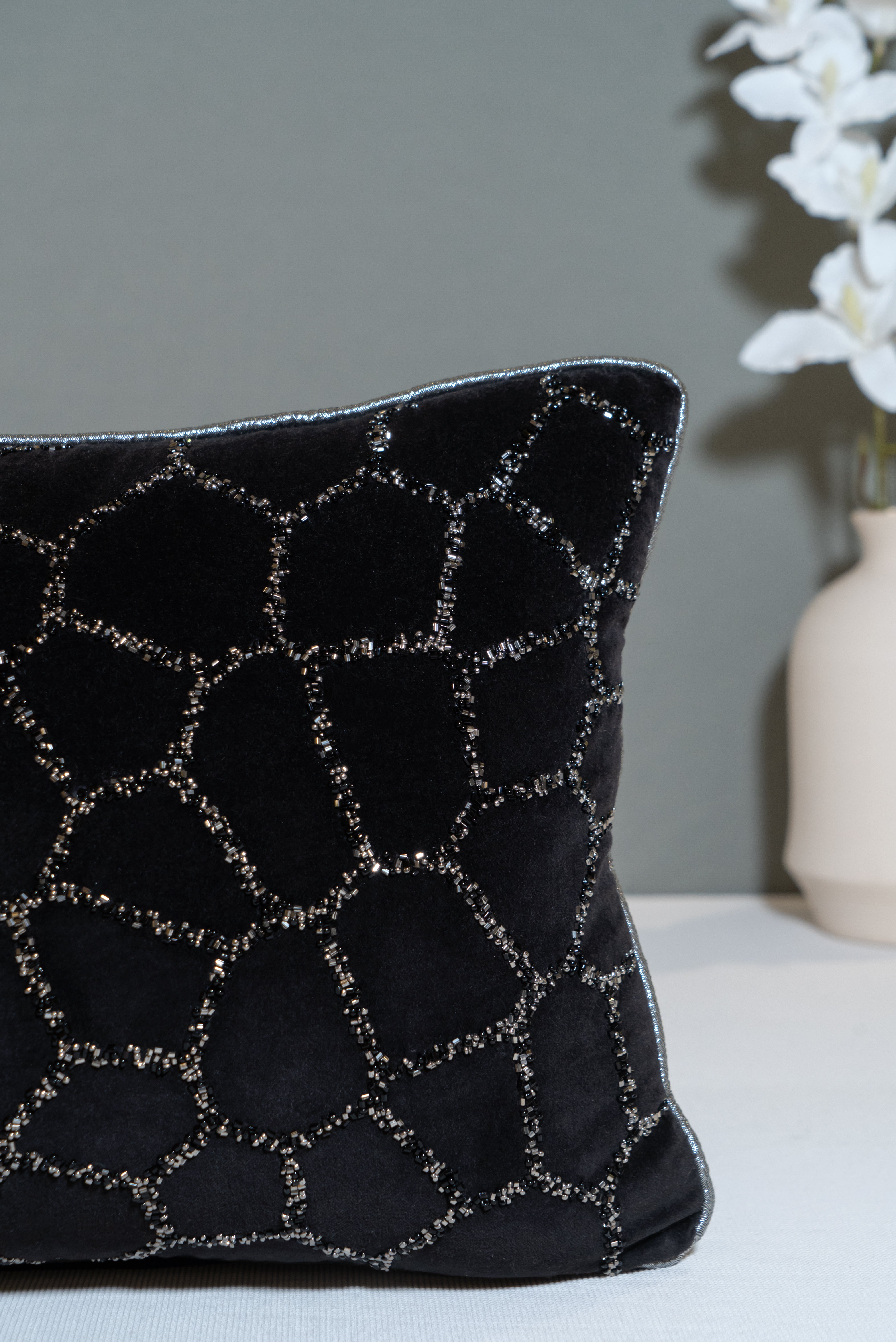 Luxury velvet cushion with a geometric or cracked pattern