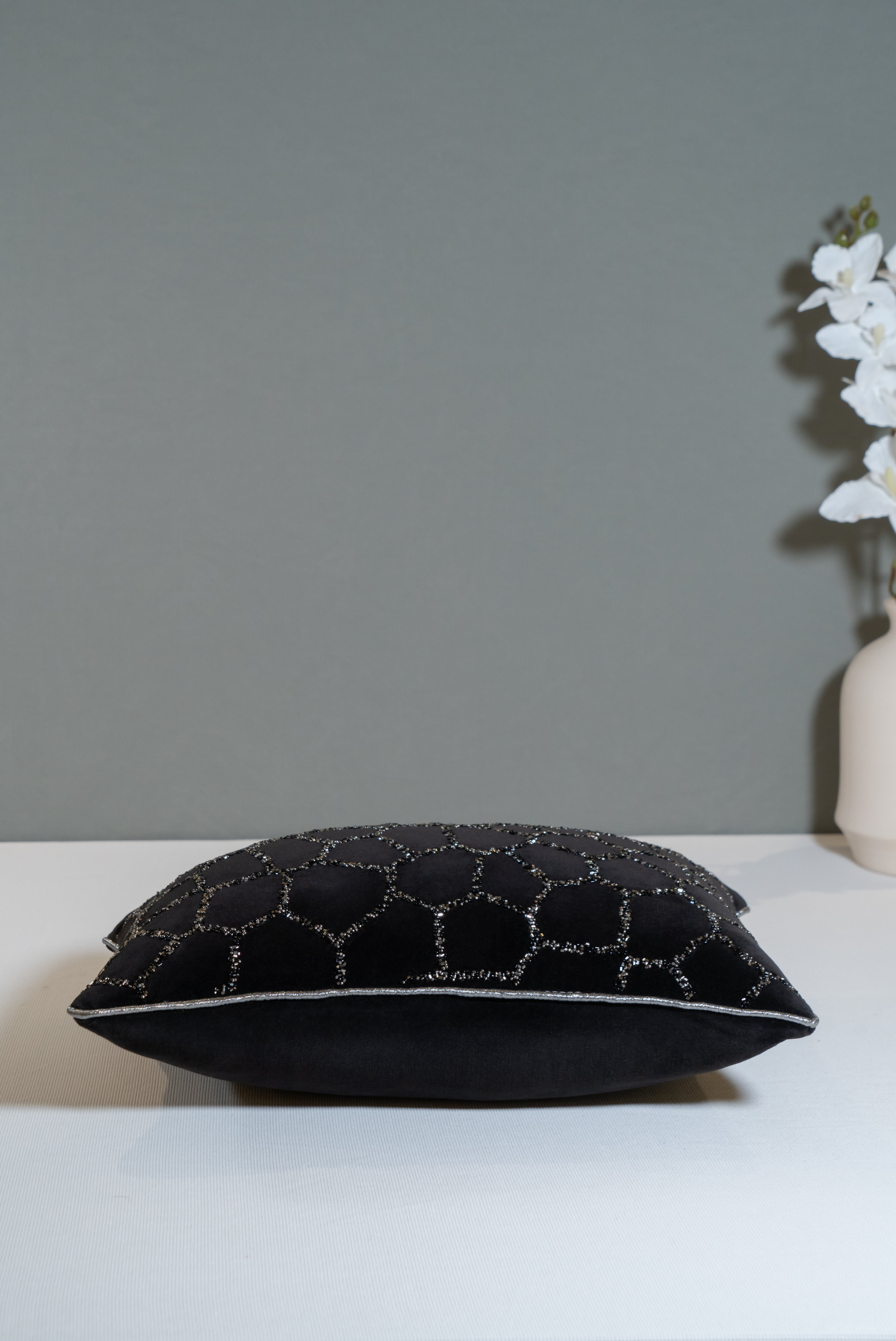 Luxury velvet cushion with a geometric or cracked pattern