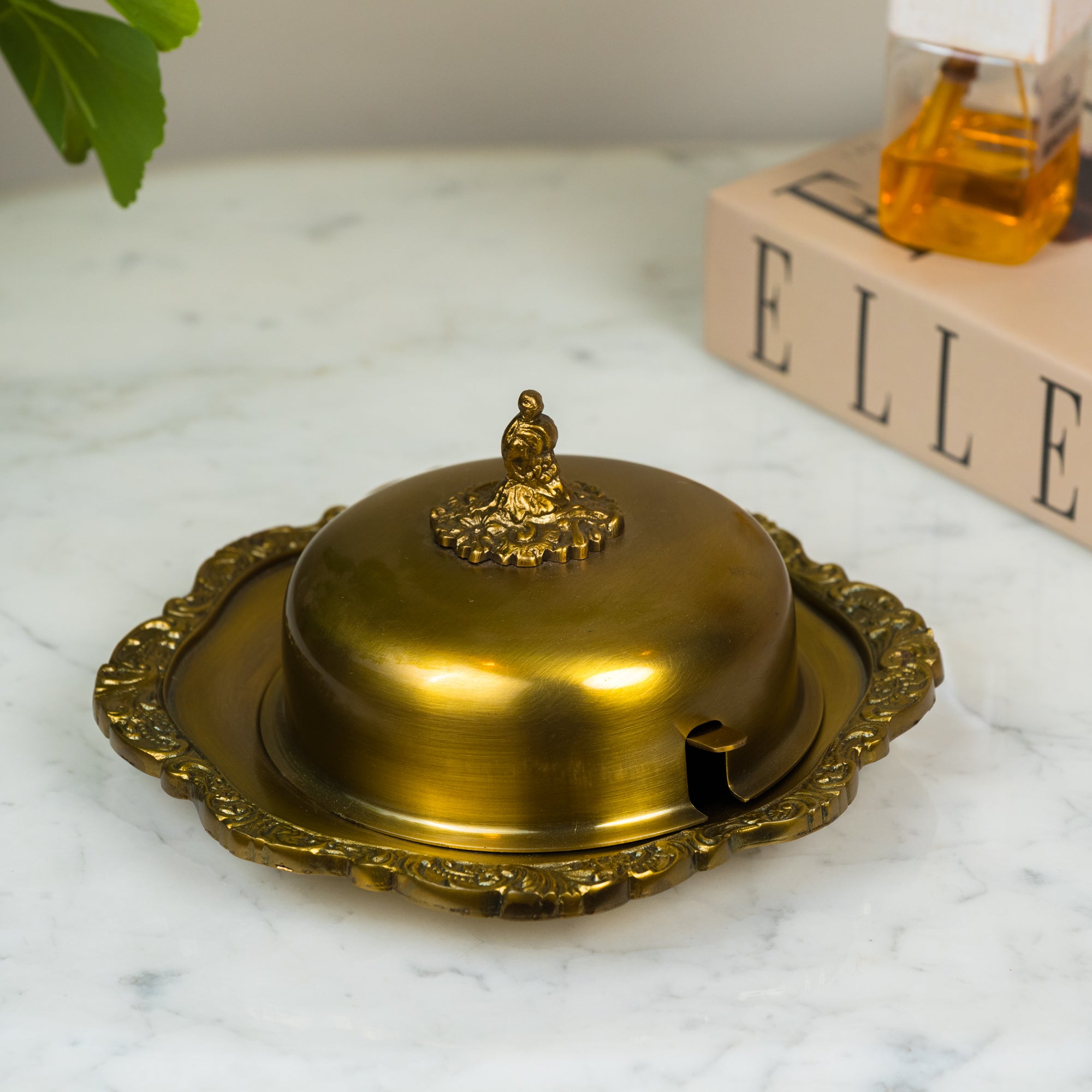 Ornate Antique Brass Butter dish with intricate carved detailing